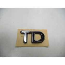 Emblemat, napis TD Ford Mondeo 1992-1996 OE 7003661