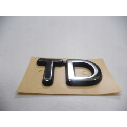 Emblemat, napis TD Ford Mondeo 1992-1996 OE 7003661