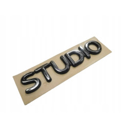 ZNACZEK EMBLEMAT STUDIO FORD FIESTA 96-02 OE 1007569