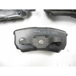 Zestaw klocków hamulcowych, hamulce tarczowe tył MOPAR Jeep OE V2011271AA