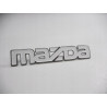 Emblemat, napis MAZDA Mazda 323 626 OE 8173 51 771A