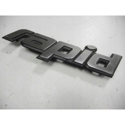 Emblemat Renault Rapid OE 7700815571