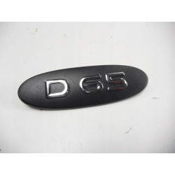 Emblemat "D65" RENAULT KANGOO 7700310093