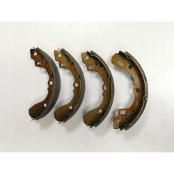 Zestaw szczęk hamulcowych tył Kia Shuma I II Sephia OE 0K201 26 38ZA