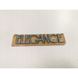 Emblemat, napis ELEGANCE Opel Corsa C Meriva A OE 9196225