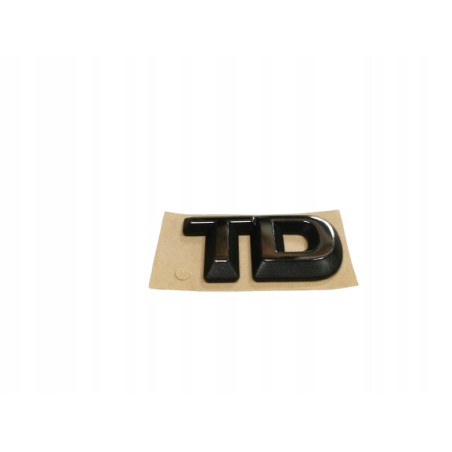 Emblemat logo tył klapy Opel Corsa B Vectra A "TD" OE 90444439