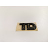 Emblemat logo tył klapy Opel Corsa B Vectra A "TD" OE 90444439