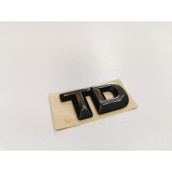 Emblemat logo tył klapy Opel Corsa B Vectra A "TD" OE 90444439