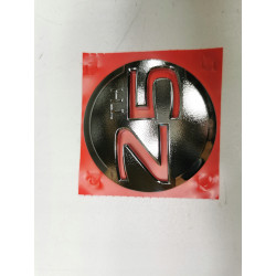 Emblemat znaczek logo KLAPY TYLNEJ NISSAN MICRA OE 90890-BG01A