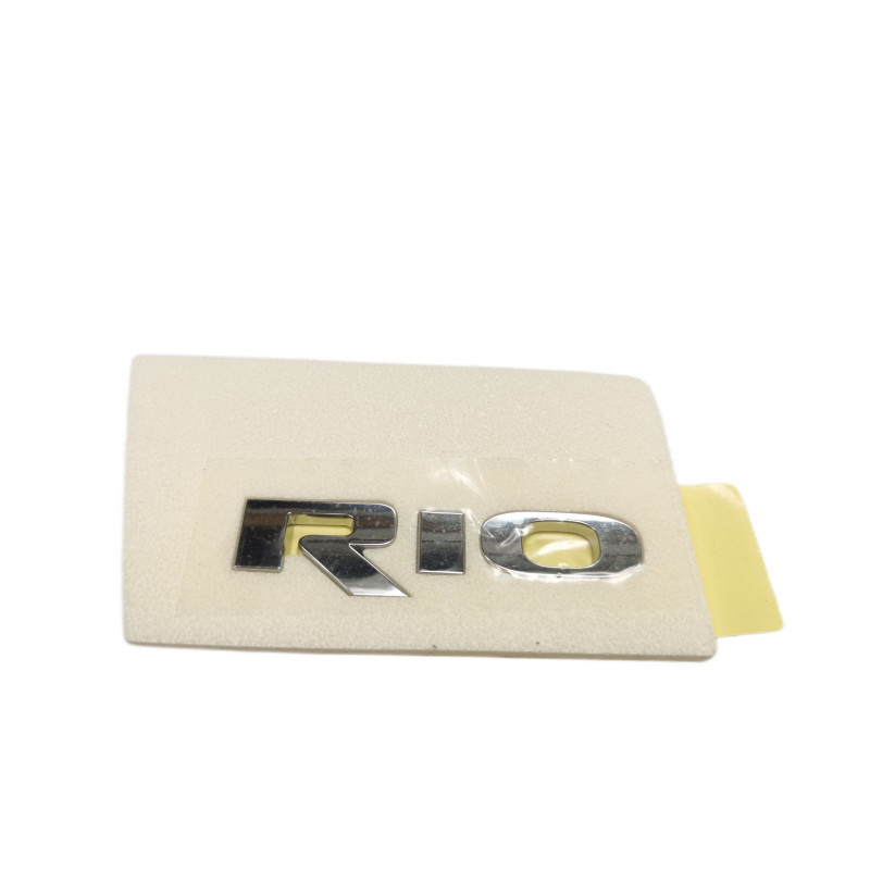 EMBLEMAT ZNACZEK NA KLAPĘ KIA RIO III 86310 1W000