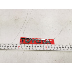EMBLEMAT, NAPIS TOYOTA KLAPY BAGAŻNIKA TOYOTA AVENSIS OE 75441-05050
